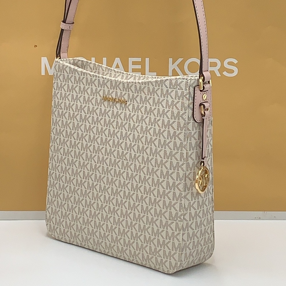 MICHAEL KORS
Jet Set Travel Large Logo Messenger Bag
COLOR PWD BLSH MLT
NWT - Picture 6 of 16